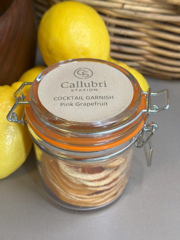 Pink Grapefruit Dried Citrus Garnish in a Jar in our Produce Store